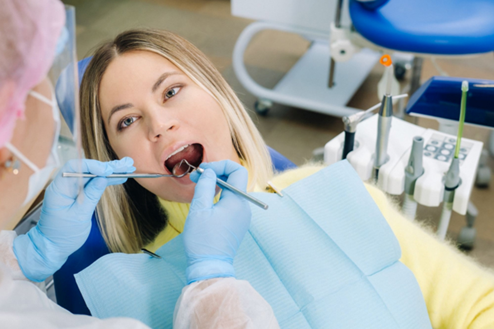 Woman receiving scaling during a deep dental clean